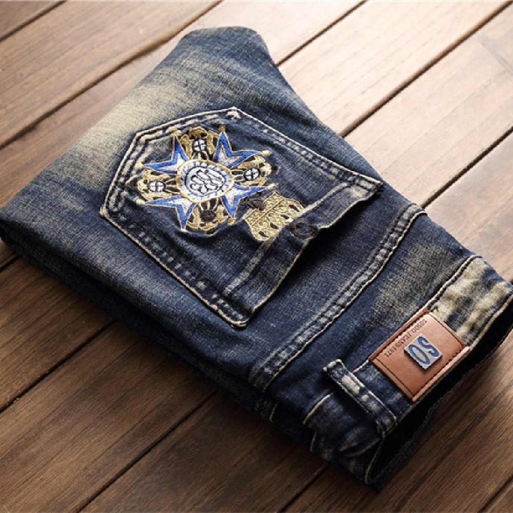 Men's Ripped Jeans Blue Embroidered Fabric European American Badge Joker Tide Jeans  -  GeraldBlack.com