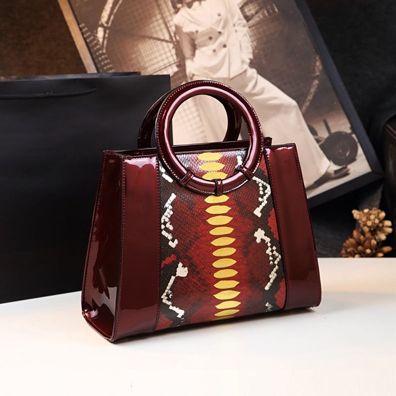 Cowhide Leather Luxury Women Serpentine Circle Portable Tote Shoulder Messenger Handbags  -  GeraldBlack.com