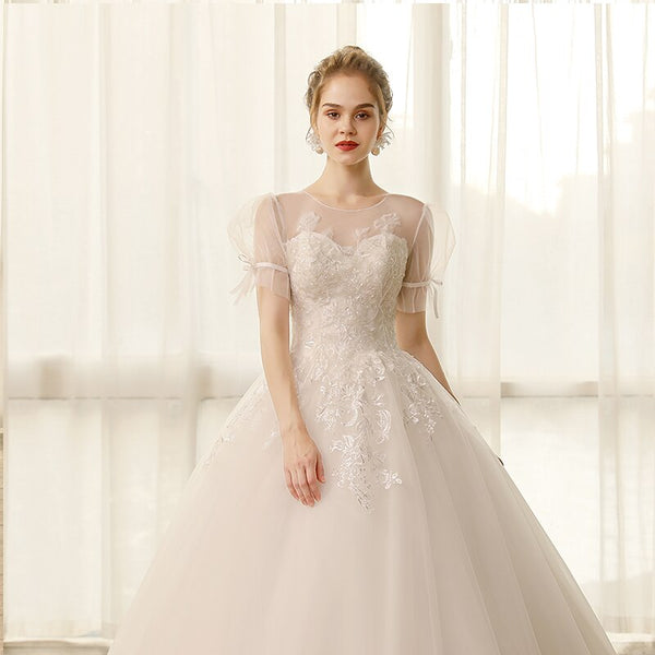 Elegant Lace Princess Wedding Dress with Puff Sleeves and Appliques - SolaceConnect.com