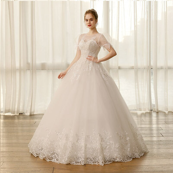 Elegant Lace Princess Wedding Dress with Puff Sleeves and Appliques - SolaceConnect.com