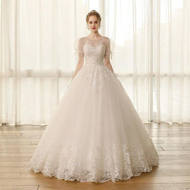Elegant Lace Princess Wedding Dress with Puff Sleeves and Appliques  -  GeraldBlack.com