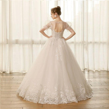 Elegant Lace Princess Wedding Dress with Puff Sleeves and Appliques  -  GeraldBlack.com