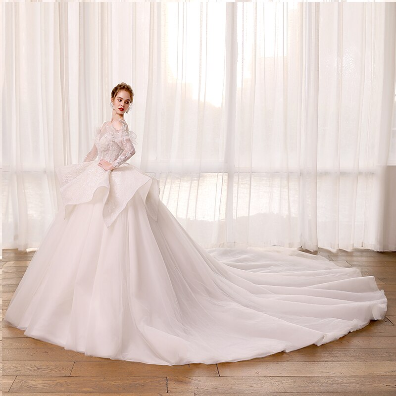 Elegant Wedding Ball Gowns with Long Sleeves and Lace Tiered Skirts - SolaceConnect.com