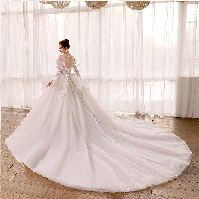 Elegant Wedding Ball Gowns with Long Sleeves and Lace Tiered Skirts  -  GeraldBlack.com