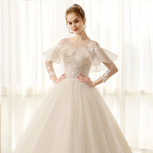 Floor Length Ball Gown Wedding Dress with Puff Sleeves and Lace Illusion - SolaceConnect.com