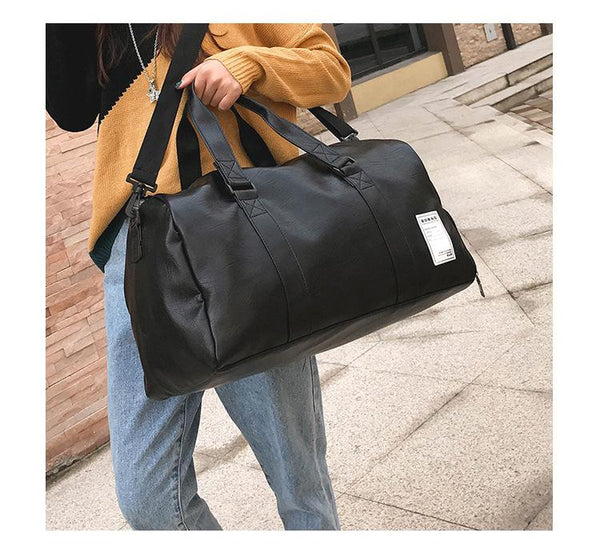 Korean Style Unisex Waterproof Leather Shoulder Wear Travel Duffle Bags - SolaceConnect.com