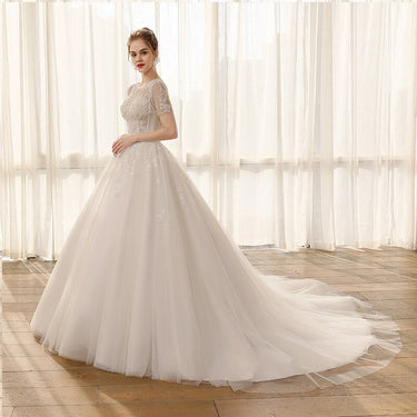 Lace Short-Sleeved Ball Gown Princess Wedding Dress with Appliques and Crystals - SolaceConnect.com