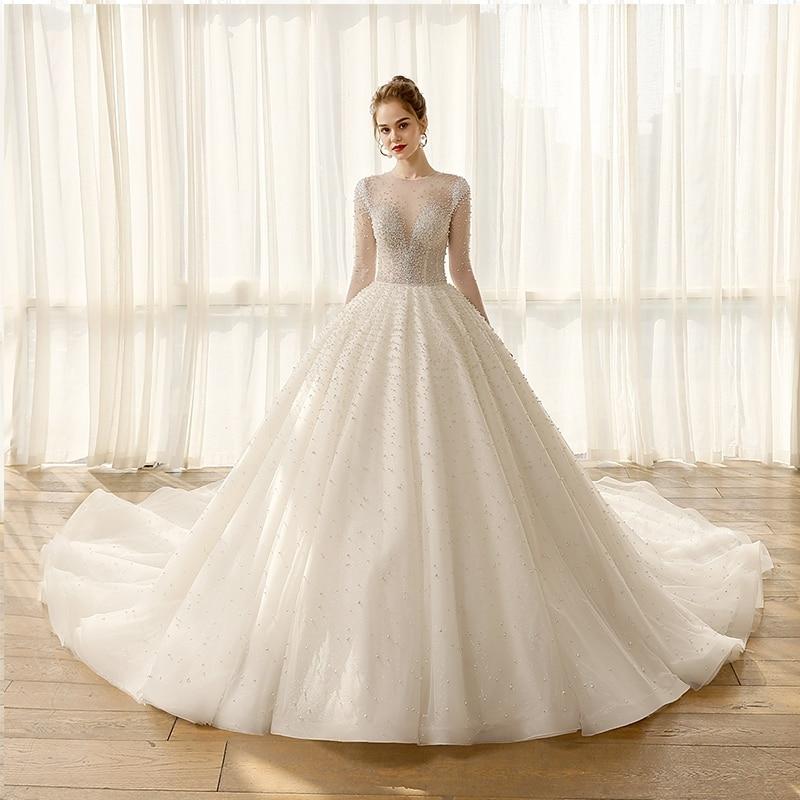 Plus Size Long Sleeve Pearl Bridal Ball Gowns with Full Sleeves  -  GeraldBlack.com