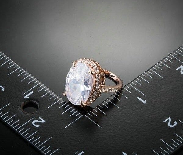 Rose Gold Color Big Oval Egg Shaped Clear Cubic Zirconia Finger Ring - SolaceConnect.com