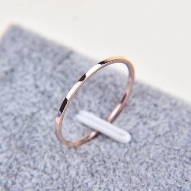 Thin Stainless Steel Couple Ring in Silver Rose Gold Color with Round Shape  -  GeraldBlack.com