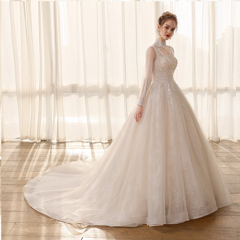 Tulle High Neckline Wedding Dresses with Long Sleeves and Lace Applique - SolaceConnect.com