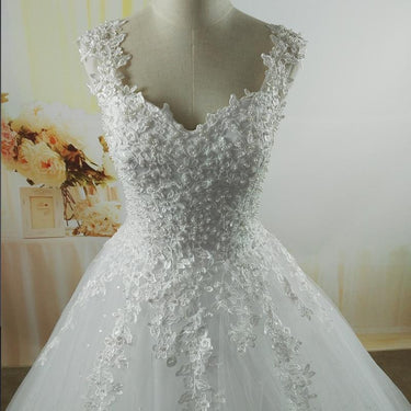 White Ivory Tulle Pearl Spaghetti Strap Bridal Ball Gown Wedding Dress - SolaceConnect.com