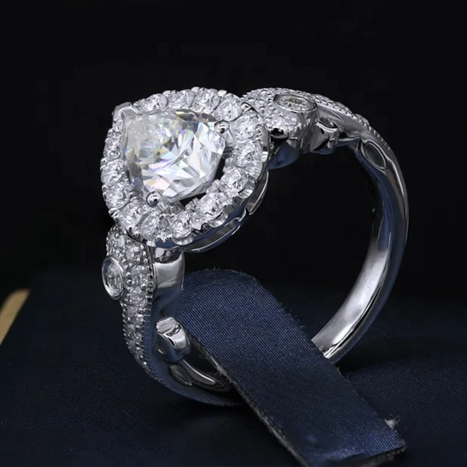 Women's 7x10mm Pear Brilliant Cut White Moissanite Engagement Rings  -  GeraldBlack.com