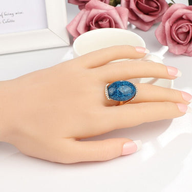 Women's Rose Gold Color Engagement Ring with Long Blue Elliptic Design  -  GeraldBlack.com