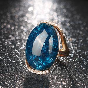 Women's Rose Gold Color Engagement Ring with Long Blue Elliptic Design - SolaceConnect.com